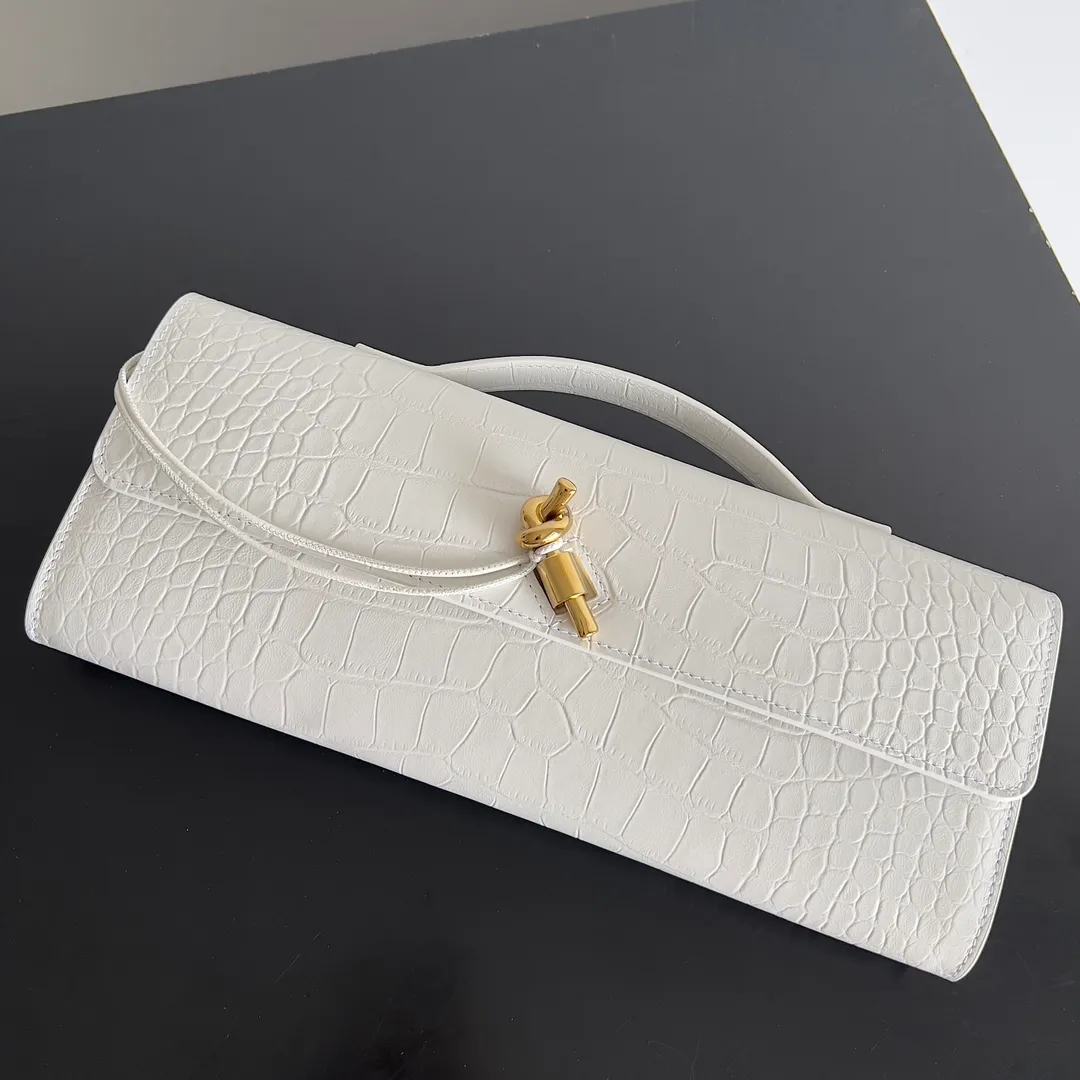Batch 1420 Bottega Veneta Fall in love with Andiamo at first sight, new design, natural Nile rare leather crocodile pattern complex handbag, a model handbag for women, no need for color cover, no emotional camouflage, immersive depth and excitement, the classic element KNOT knot is inspired, modernist aesthetics and jewelry field craftsmanship reinterpret the knot element, bringing a clutch full of modern texture and elegant and quiet lady spirit. Style number: 741511 Size: 31*13*3cm